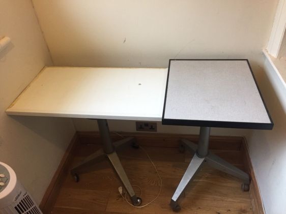 Two Height Adjustable Tables