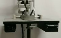 Haag - Streit Slit lamp with a table