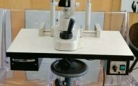 Topcon SL-3D slit lamp with a table 